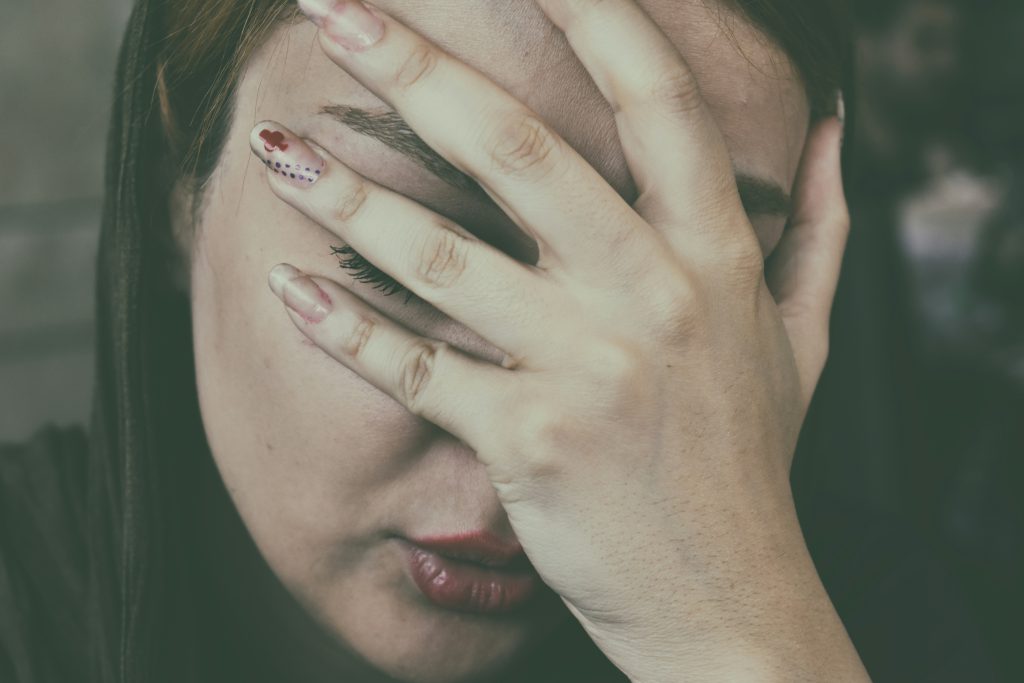 Person appearing fatigued, representing idiopathic hypersomnia and flumazenil treatment research in the UK.