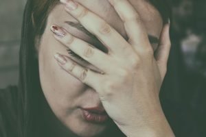 Person appearing fatigued, representing idiopathic hypersomnia and flumazenil treatment research in the UK.